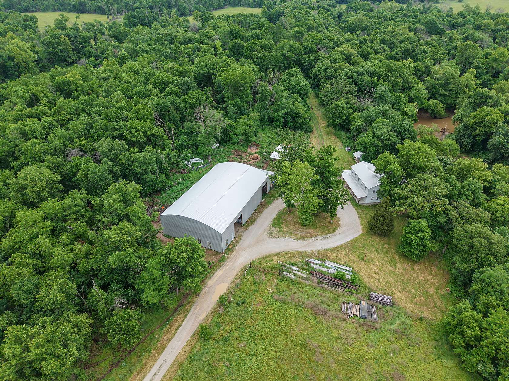 88 Acres of Land with Home for Sale in El Dorado Springs, Missouri