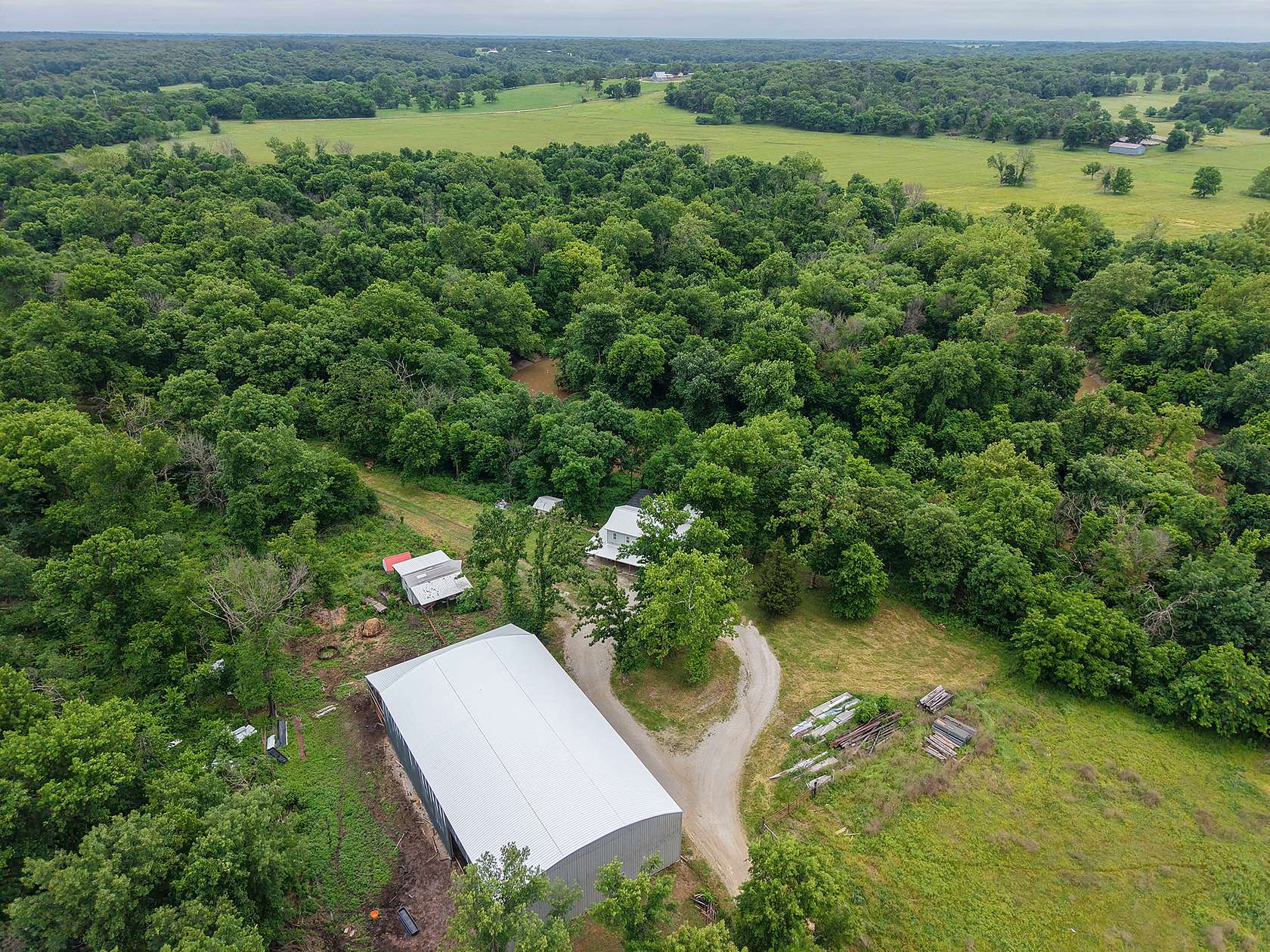 88 Acres of Land with Home for Sale in El Dorado Springs, Missouri