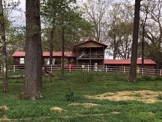 86.6 Acres of Land with Home for Sale in Sturkie, Arkansas