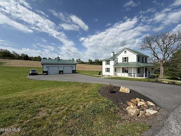 12 Acres of Land with Home for Sale in Breezewood, Pennsylvania