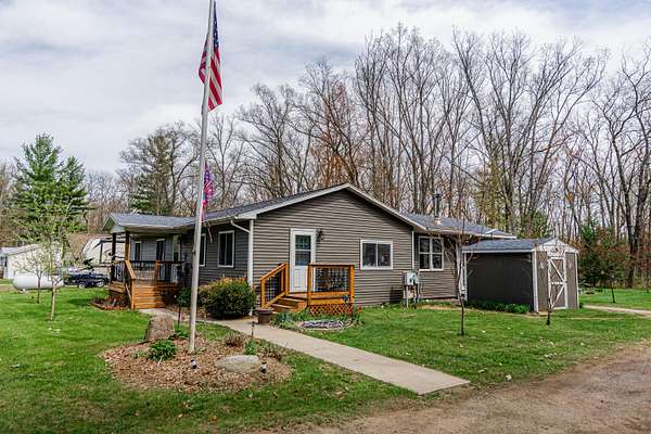 26 Acres of Recreational Land with Home for Sale in Bitely, Michigan