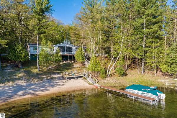 5.47 Acres of Land with Home for Sale in Lake Ann, Michigan