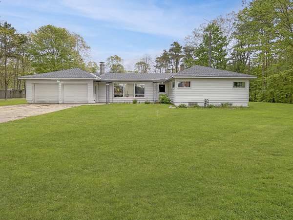 5.82 Acres of Land with Home for Sale in Holton, Michigan