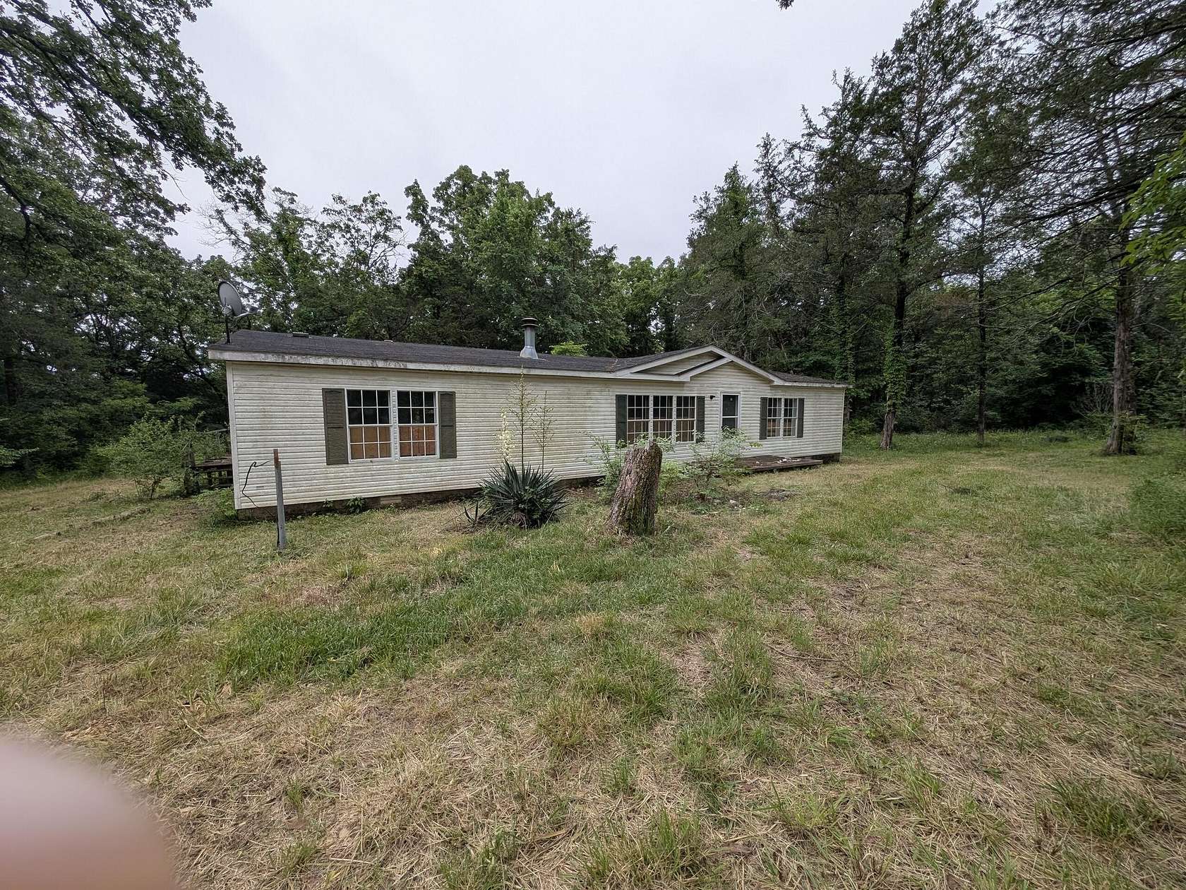 11.7 Acres of Land with Home for Sale in Kissee Mills, Missouri