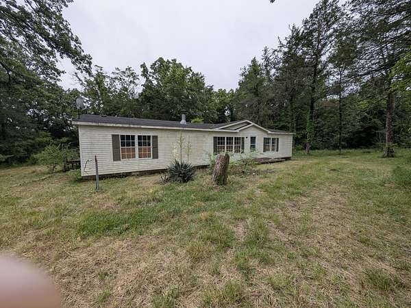 11.7 Acres of Land with Home for Sale in Kissee Mills, Missouri
