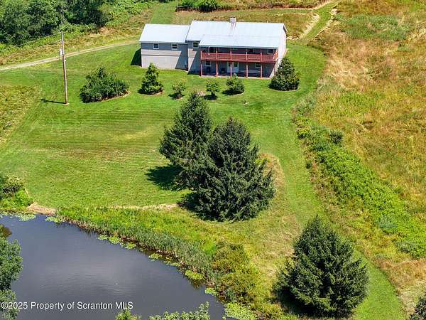 42 Acres of Recreational Land with Home for Sale in Montrose, Pennsylvania