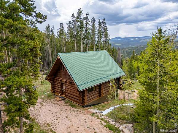 3 Acres of Land with Home for Sale in Red Feather Lakes, Colorado