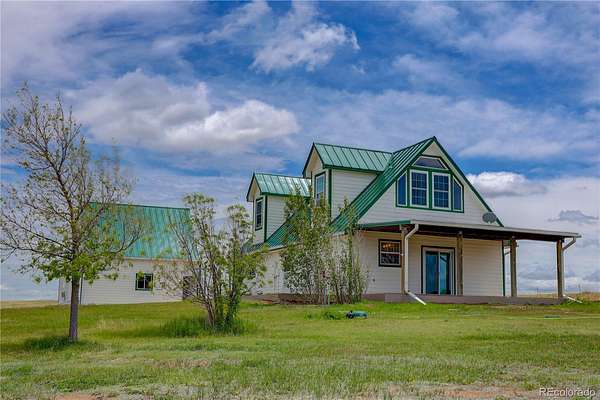 35 Acres of Agricultural Land with Home for Sale in Elizabeth, Colorado