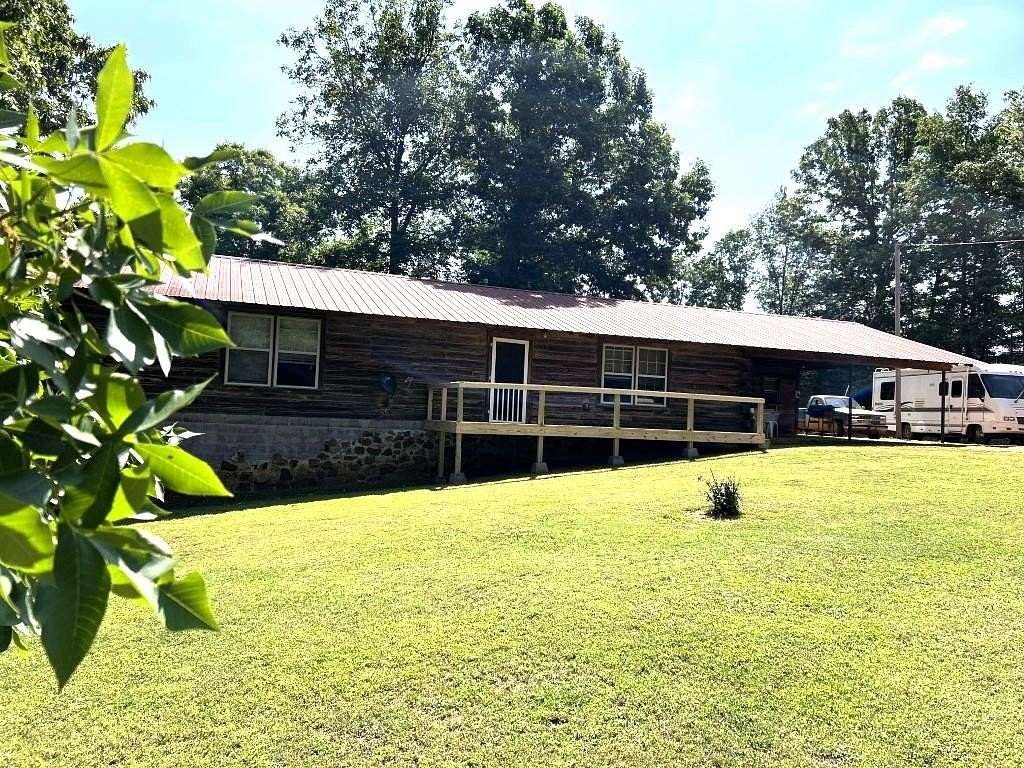 10 Acres of Land with Home for Sale in Mountain View, Arkansas