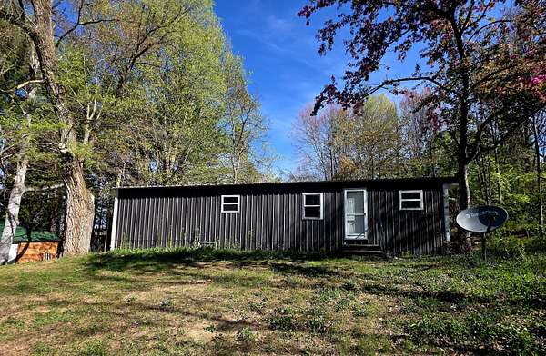 2.5 Acres of Land with Home for Sale in White Cloud, Michigan