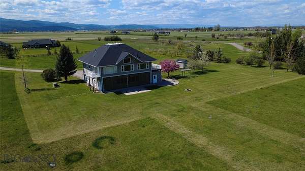 5 Acres of Land with Home for Sale in Kalispell, Montana