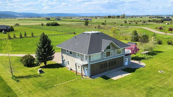 5 Acres of Land with Home for Sale in Kalispell, Montana