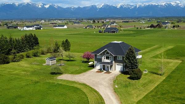 5 Acres of Land with Home for Sale in Kalispell, Montana