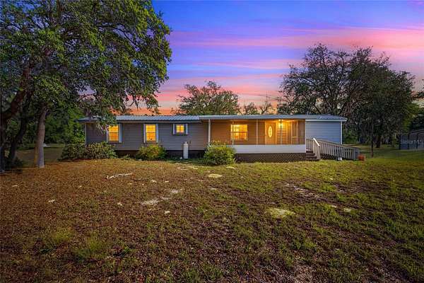 4.84 Acres of Land with Home for Sale in Archer, Florida