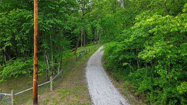 7.78 Acres of Land with Home for Auction in Strasburg, Ohio
