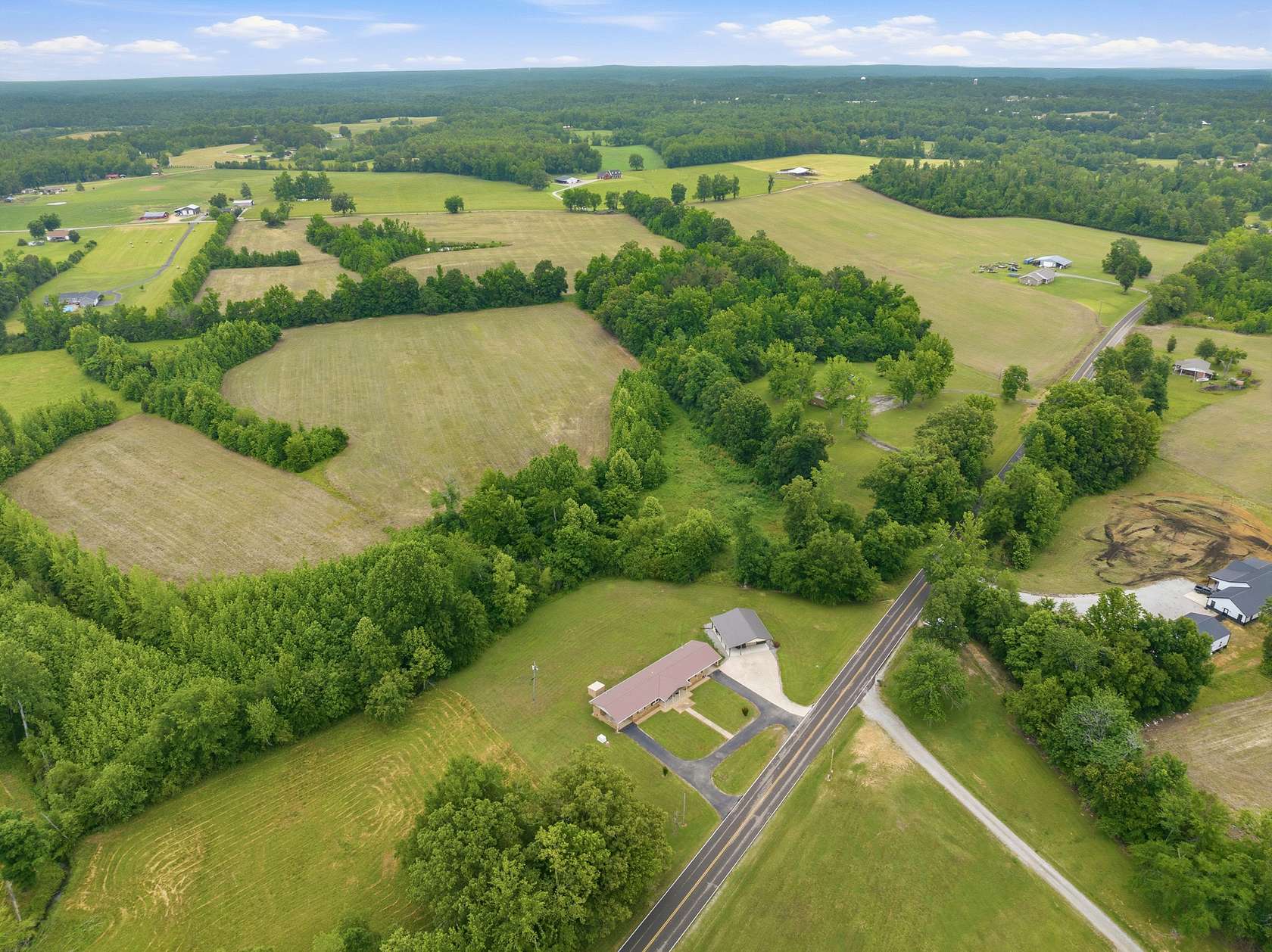 1.59 Acres of Land with Home for Sale in Decaturville, Tennessee