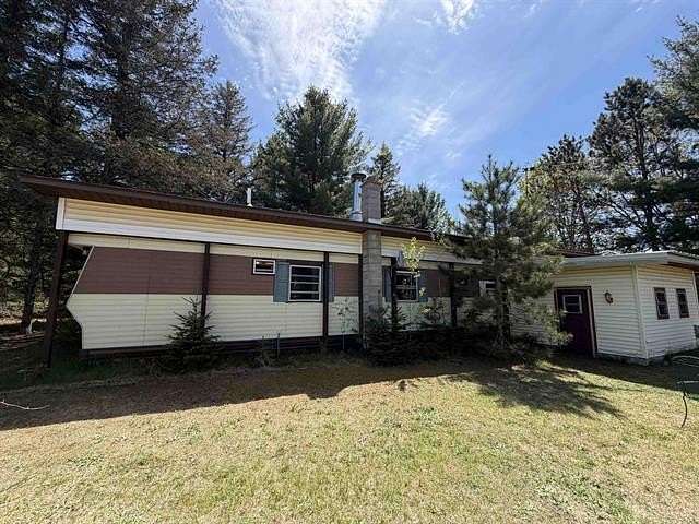 20 Acres of Recreational Land with Home for Sale in Homestead Township, Michigan