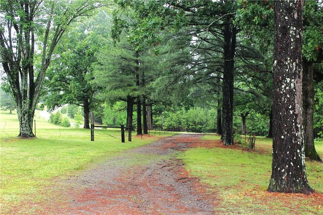 98 Acres of Land with Home for Sale in Rudy, Arkansas