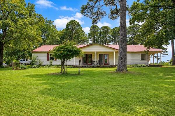 98 Acres of Land with Home for Sale in Rudy, Arkansas