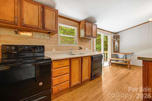 2.6 Acres of Land with Home for Sale in Candler, North Carolina