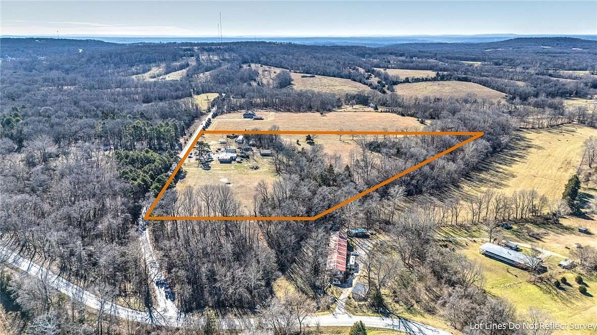 14.6 Acres of Land with Home for Sale in Garfield, Arkansas