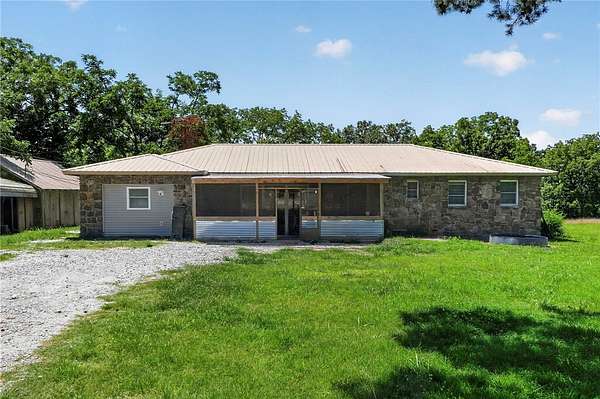 14.6 Acres of Land with Home for Sale in Garfield, Arkansas