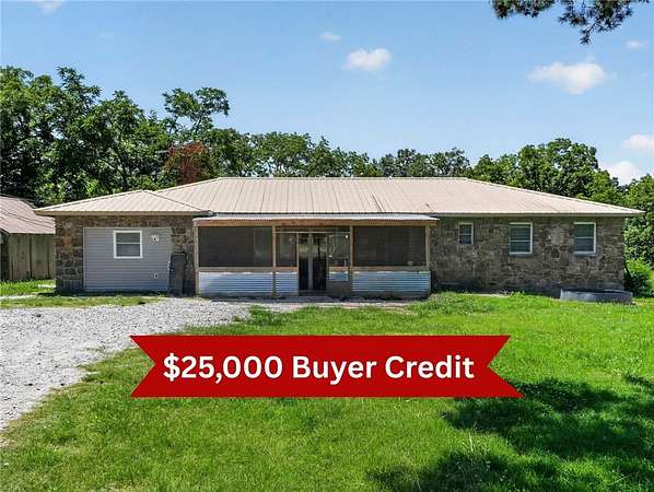 14.6 Acres of Land with Home for Sale in Garfield, Arkansas