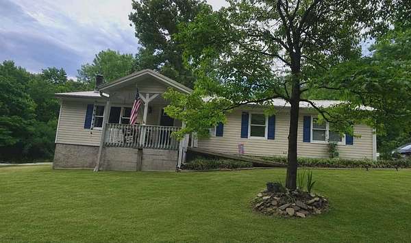 1.5 Acres of Land with Home for Sale in Canton, Georgia