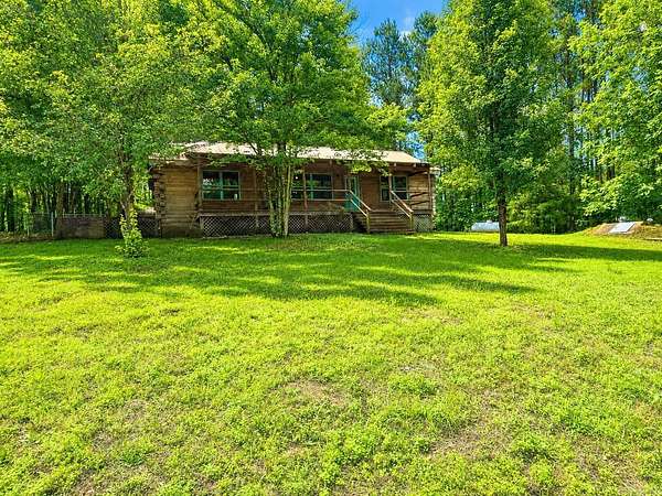 4 Acres of Land with Home for Sale in Bonnerdale, Arkansas