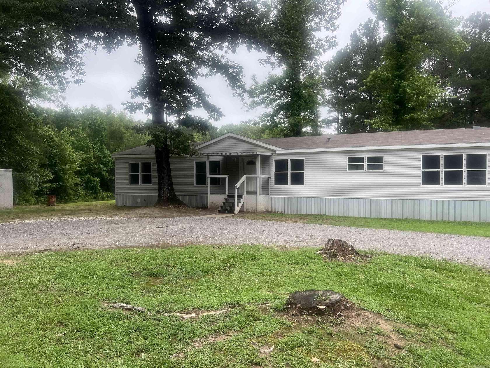 6.16 Acres of Land with Home for Sale in Grapevine, Arkansas