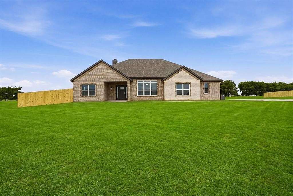 10.2 Acres of Land with Home for Sale in Grandview, Texas