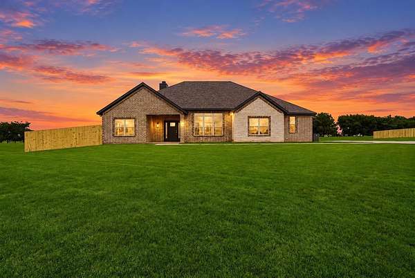 10.2 Acres of Land with Home for Sale in Grandview, Texas