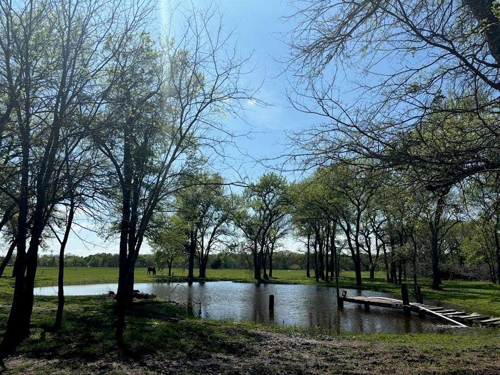 3 Acres of Land with Home for Sale in Wolfe City, Texas