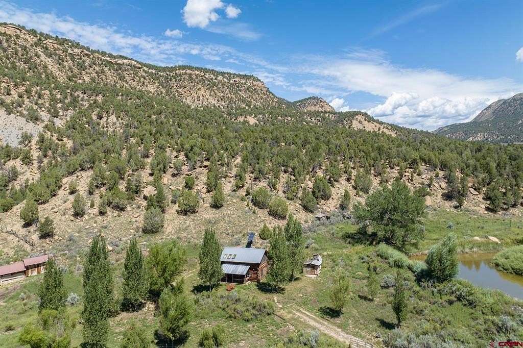 79 Acres of Land with Home for Sale in Mancos, Colorado
