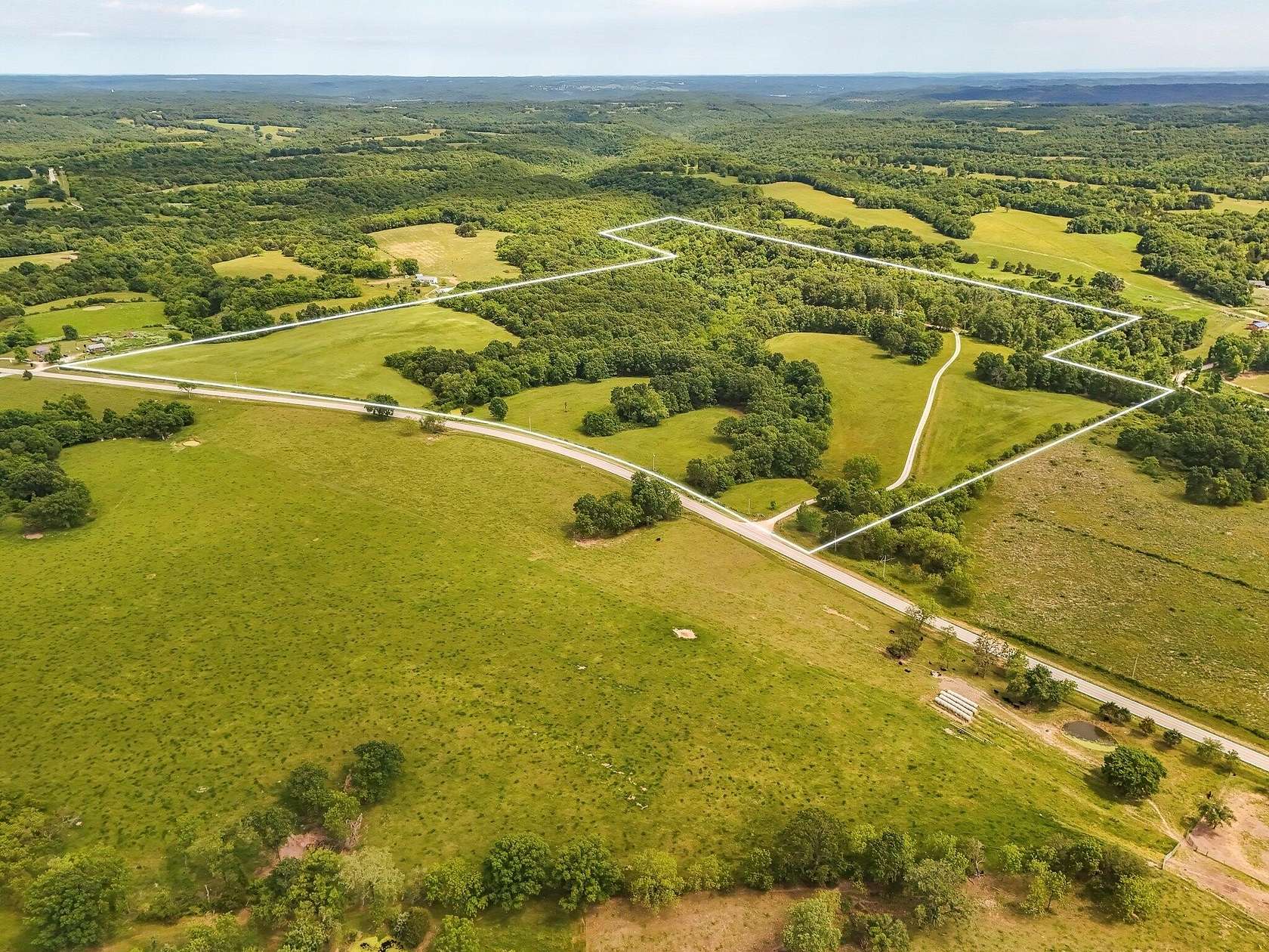 73.2 Acres of Land with Home for Sale in Galena, Missouri