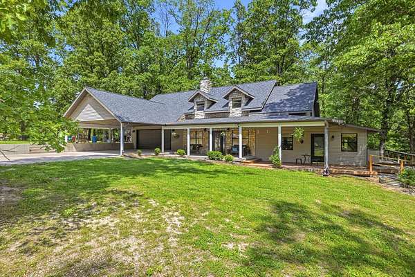 73.2 Acres of Land with Home for Sale in Galena, Missouri