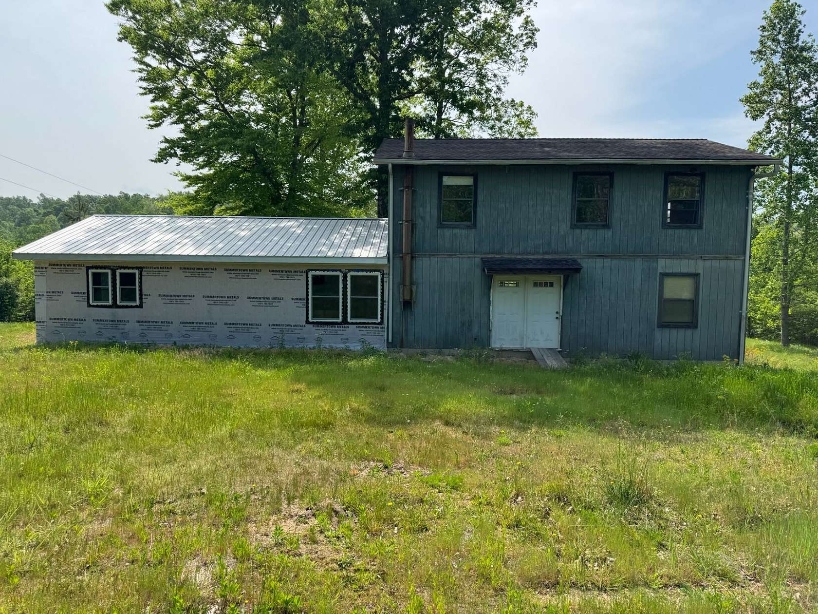 50.7 Acres of Recreational Land with Home for Sale in Hampshire, Tennessee