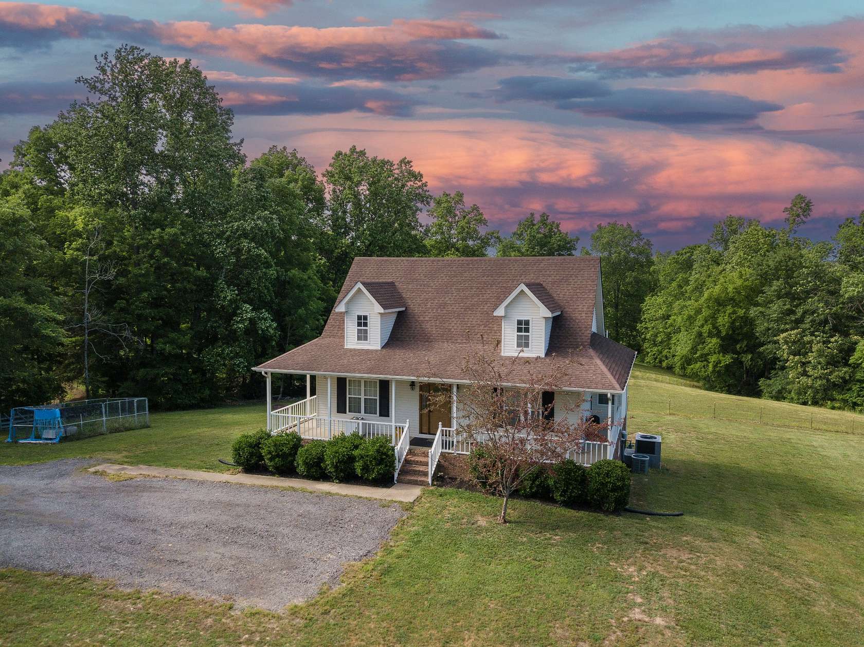 9.4 Acres of Land with Home for Sale in Charlotte, Tennessee