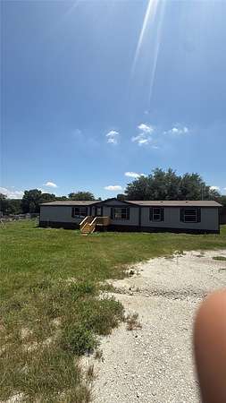1.72 Acres of Land with Home for Sale in Springtown, Texas