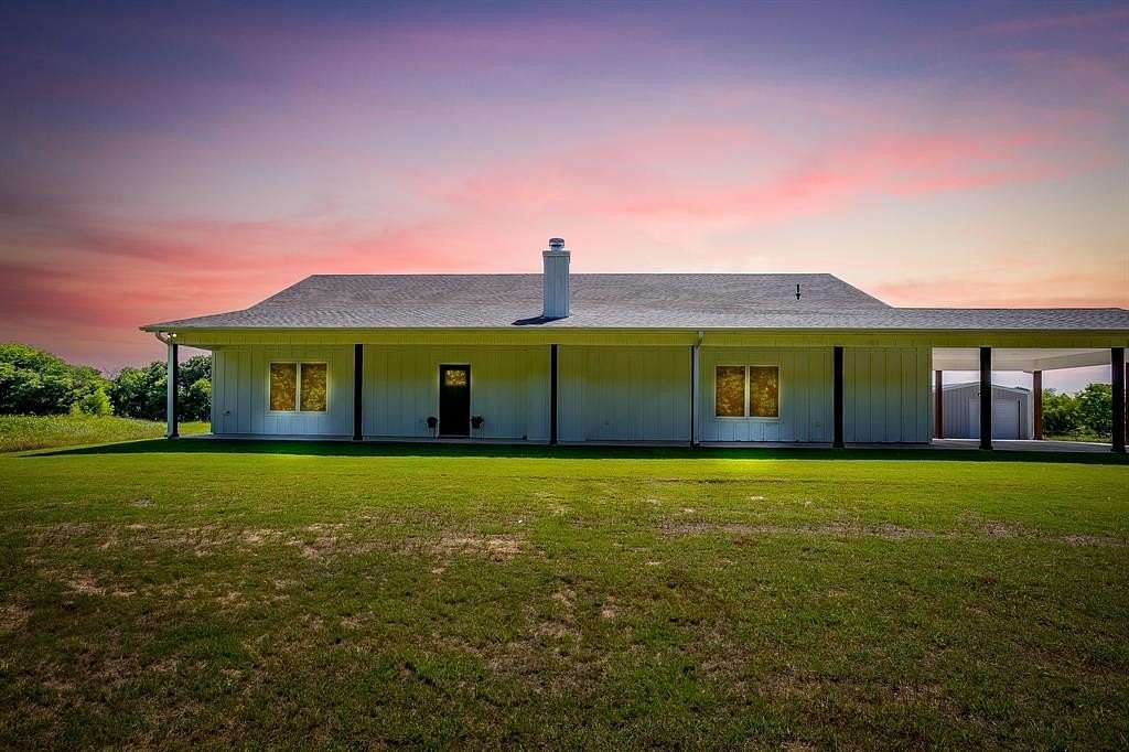 19.2 Acres of Land with Home for Sale in Grandview, Texas