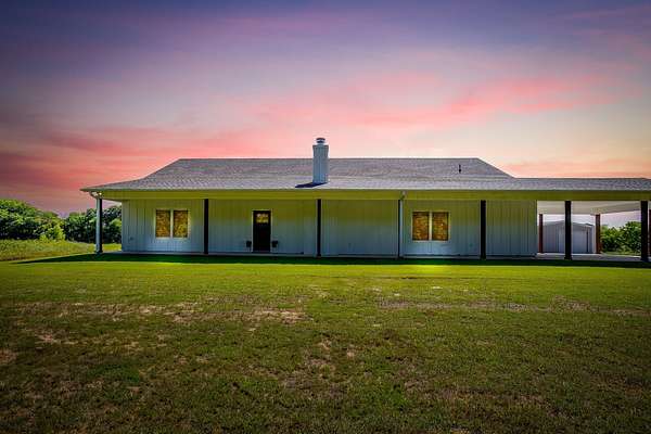 19.2 Acres of Land with Home for Sale in Grandview, Texas