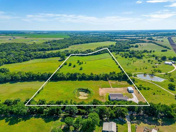 19.2 Acres of Land with Home for Sale in Grandview, Texas