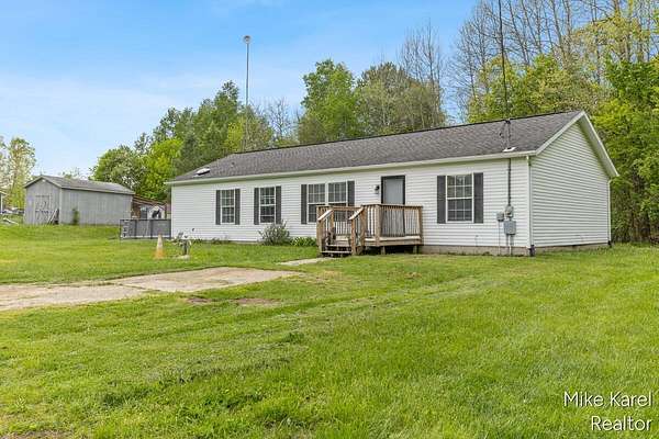 2.67 Acres of Land with Home for Sale in Cedar Springs, Michigan