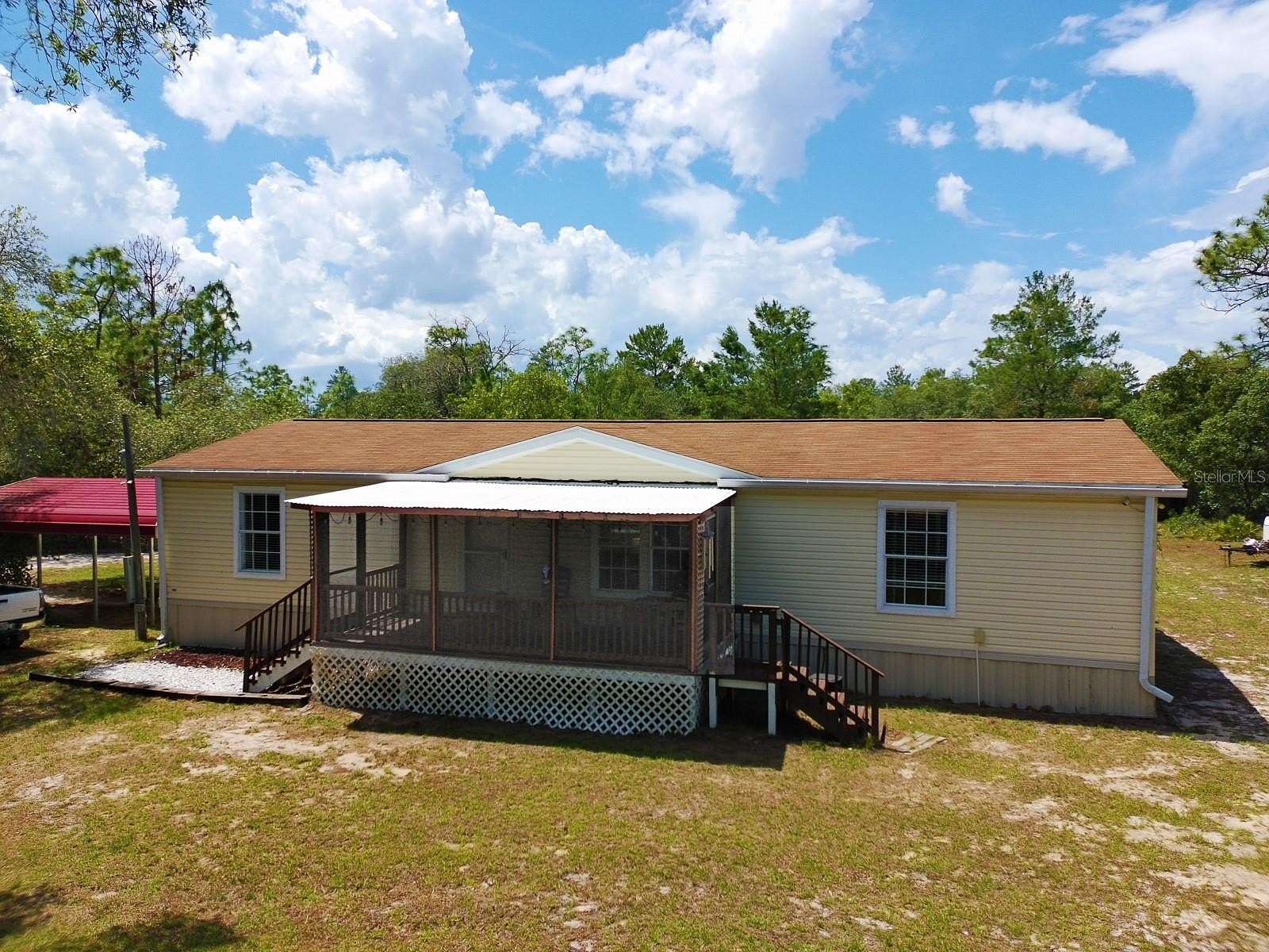 2.62 Acres of Land with Home for Sale in Dunnellon, Florida