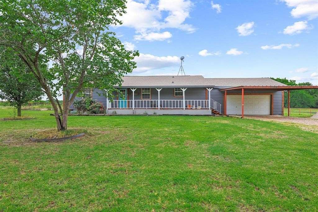 2 Acres of Land with Home for Sale in Wolfe City, Texas
