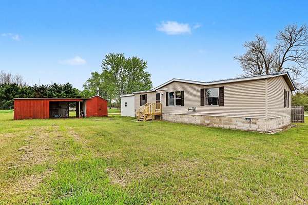 5.38 Acres of Land with Home for Sale in Morley, Michigan