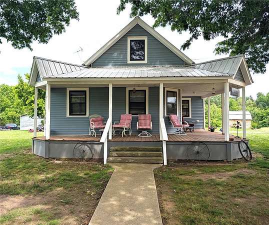 2.64 Acres of Land with Home for Sale in Berryville, Arkansas
