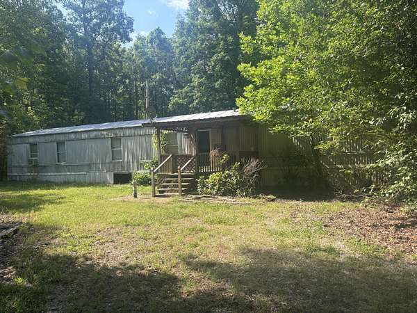 2.53 Acres of Land with Home for Sale in Hickory Flat, Mississippi
