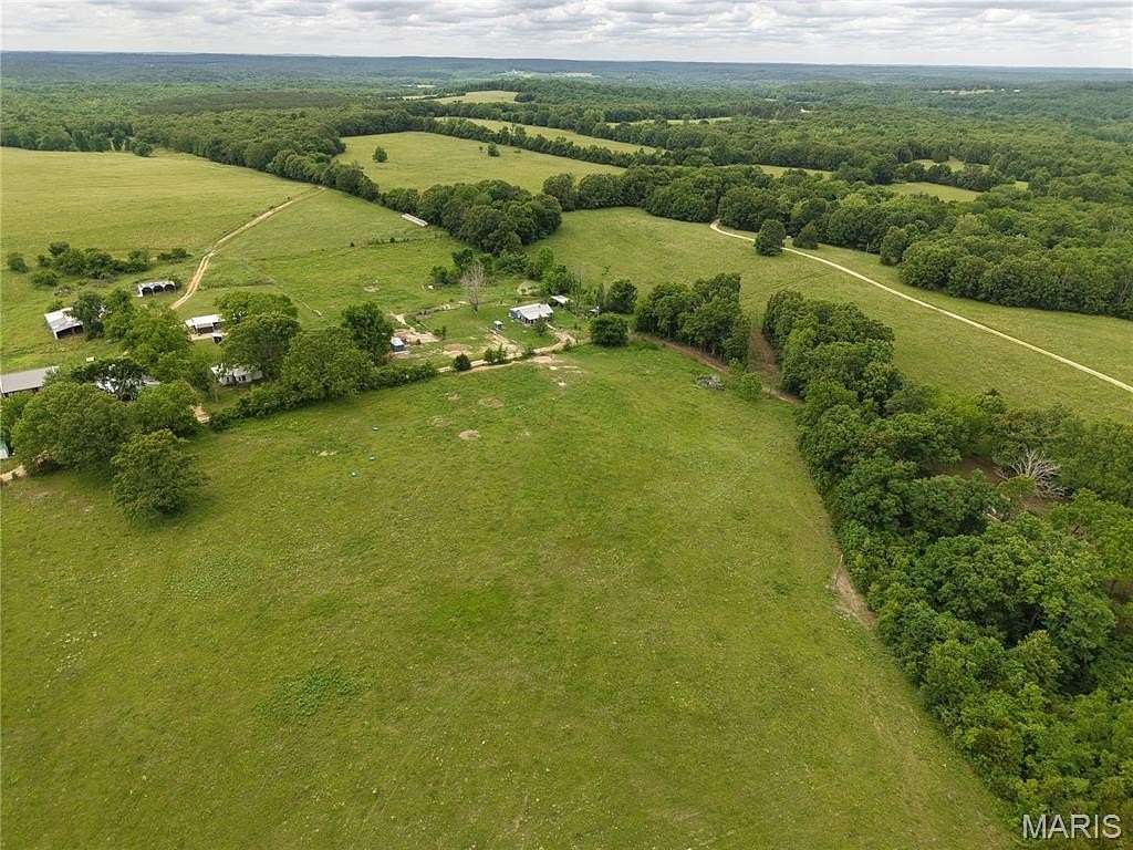 13.1 Acres of Land with Home for Sale in Falcon, Missouri