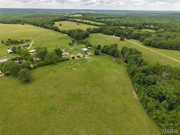 13.1 Acres of Land with Home for Sale in Falcon, Missouri